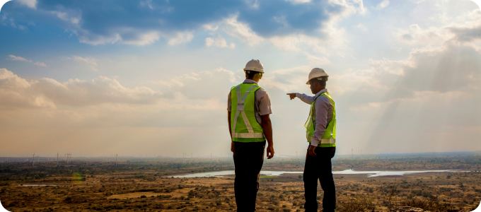 Engineers surveying a project site